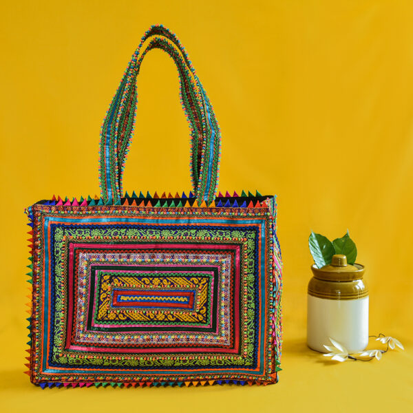 Team Inspiring Indian - Pabiben Rabari, the lady behind one of the leading  woman artisan enterprise, is well known for her pabi bags and her own form  of embroidery art- 'Hari Jari'.