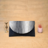 Upcycled plastic weaving clutch